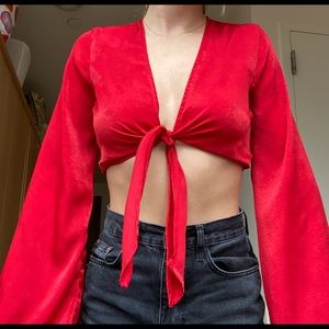 Urban Outfitters red and tie up top with bell sleeves!